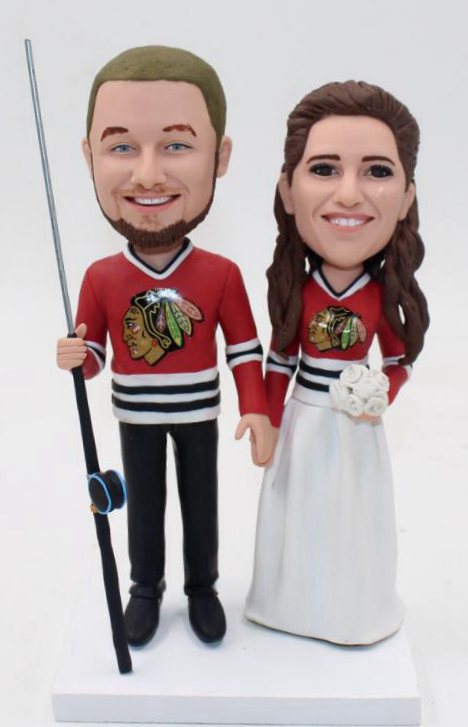 Blackhawks wedding cake topper with fishing rod