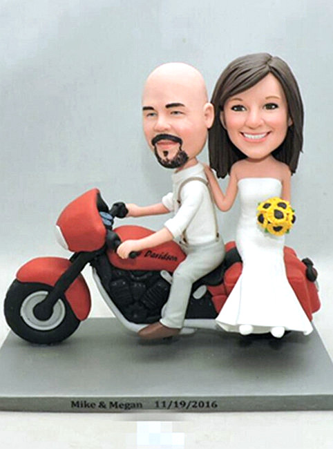 Custom cake topper couple riding on motorbike