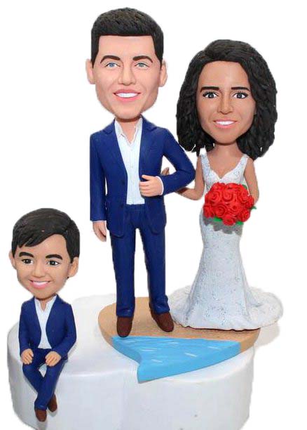 Custom wedding cake topper with kid sit on the cake