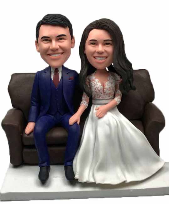 Personalized cake topper sitting on sofa