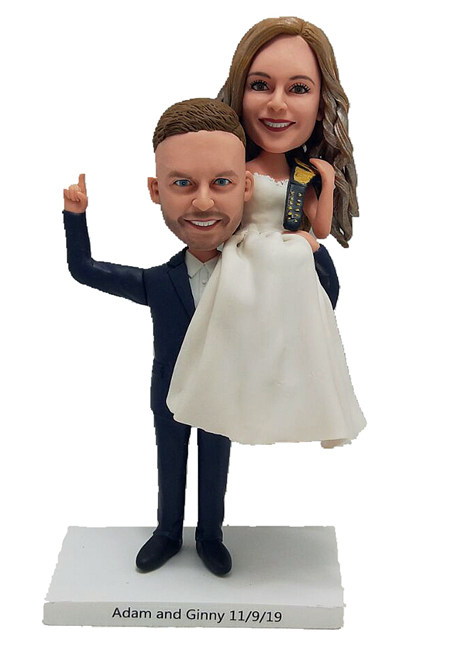 Custom cake topper bride holding champion belt